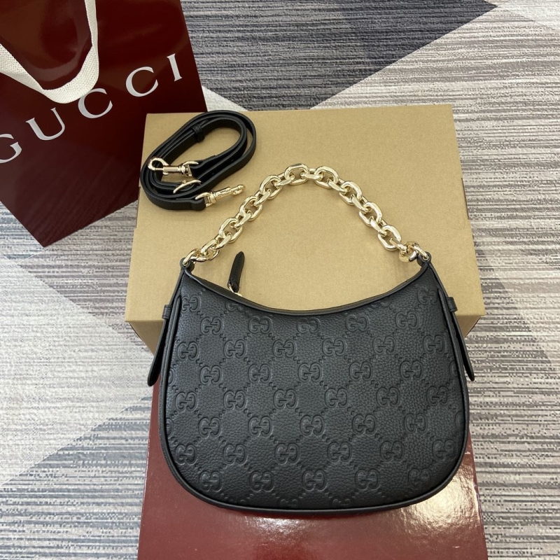G*u*i top handle bags